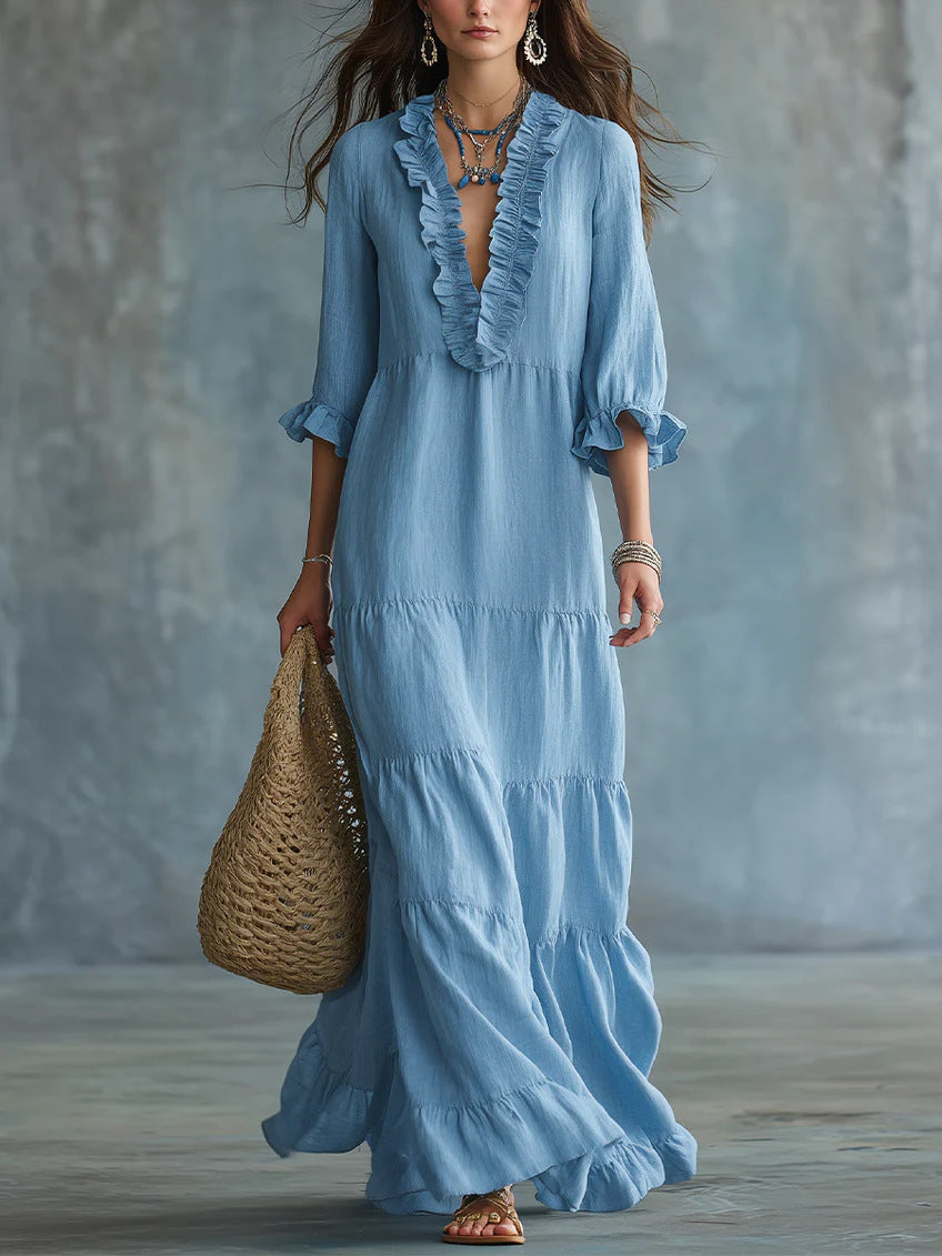 Vestido largo escote en V con bajo de volantes Nuvara en azul