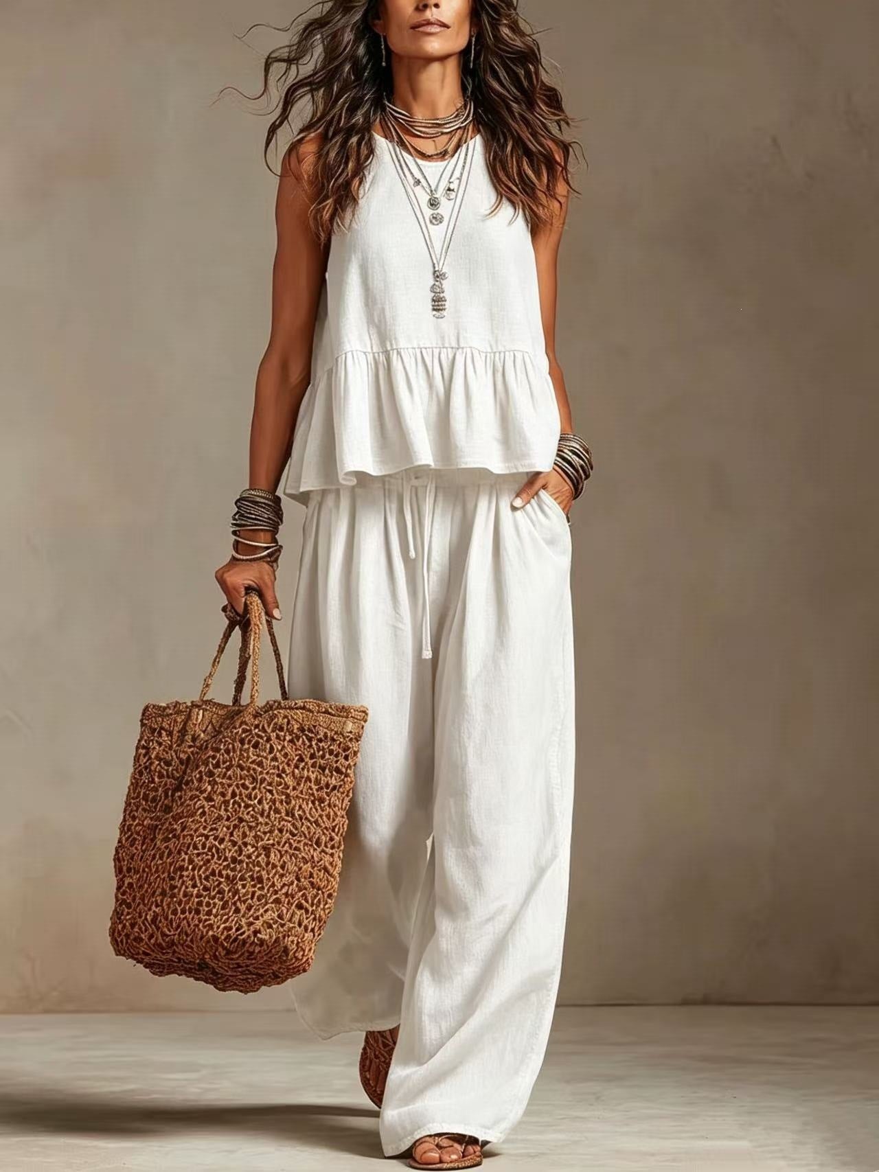 Conjunto top con volante y palazzo Nuvara en blanco