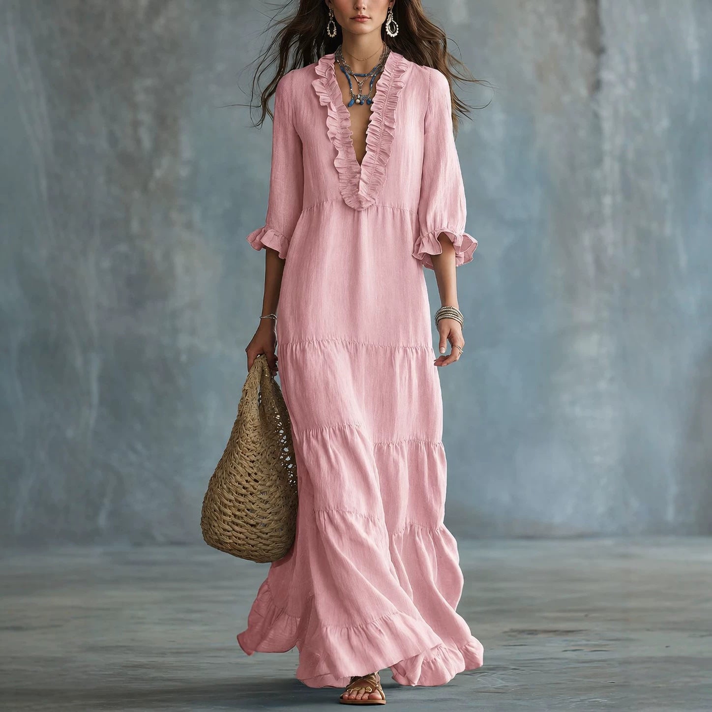 Vestido largo escote en V con bajo de volantes Nuvara en rosa