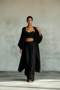 Trío · Conjunto Cárdigan, Top y Palazzo — Negro — editorial